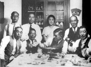 Dec. 1941 photograph of Issei (first generation) 
Japanese American Central Coast Pioneer Families: H. Yaemon Minami of Minami Farms (seated, second from left), Naoichi Ikeda of Ikeda Farms (seated, second from right), Setsuo Aratani of Guadalupe Produce (seated, far right), and Masuko Aratani, a principal of All Star Trading (standing)